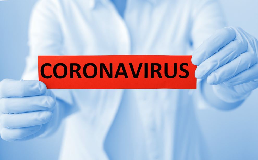 Skilt, hvor der står coronavirus